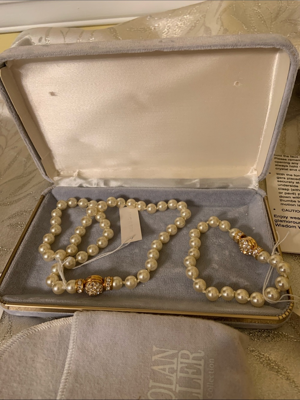 Nolan Miller Ivory Pearl Necklace and Bracelet with Gold Accent Clasps
